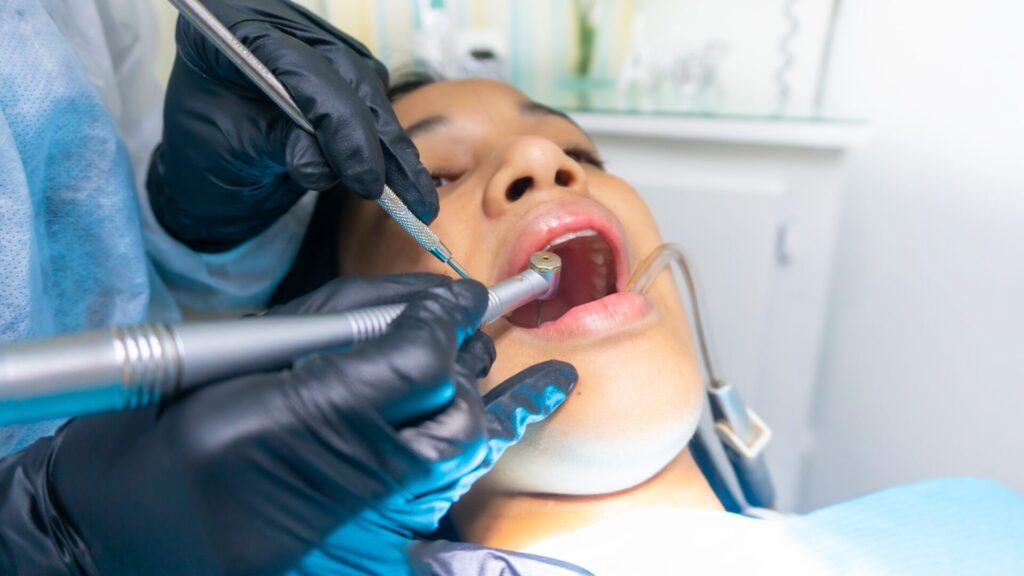 woman under dental procedure